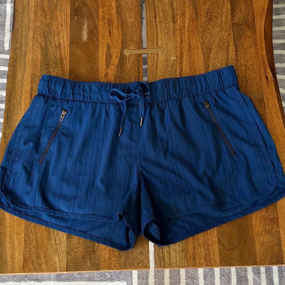 Athleta Navy Blue Athletic Shorts with Zip Pockets